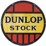 Advertising enamel sign DUNLOP STOCK. In very good condition with minor edge chipping. Measures 24in