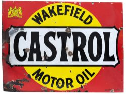 Motoring enamel sign WAKEFIELD CASTROL MOTOR OIL. Measures 48in x 36in and is in good condition with