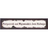 Enamel poster board heading PORTPATRICK AND WIGTOWNSHIRE JOINT RAILWAYS dating to around 1885.