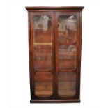 An Edwardian mahogany glazed bookcase