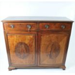 A large George III mahogany hall cupboard