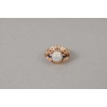 A diamond and sapphire dress ring