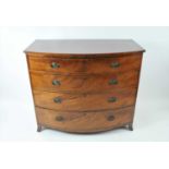 A large 19th century mahogany veneered bow-fronted chest of four graduating long drawers