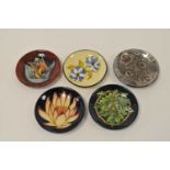 Five Moorcroft coasters/pin dishes