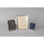 Three silver mounted frames