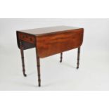 A 19th century mahogany Pembroke table