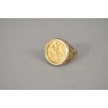 A 9ct gold sovereign set ring