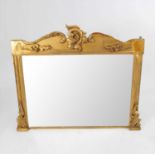 A large 19th century gilt plaster framed over-mantle mirror
