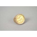 A 9ct gold half sovereign set ring