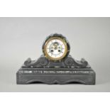 A large Victorian black slate and green marble cased mantle clock