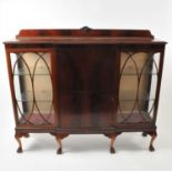 A 1920's mahogany George II style breakfront display cabinet
