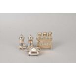 A three piece silver cruet set