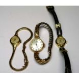 A collection of three ladies watches comprising of a Rotary stamped 18k, a yellow metal Perona and a