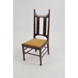 A small Art Nouveau inlaid mahogany chair