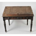 An early 20th century oak clerk's desk