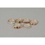 Six 9ct gold rings
