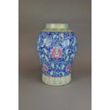 A large Chinese porcelain baluster vase (extensively restored)