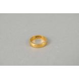 A 22ct gold wedding band