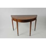 A good quality 19th century demi-lune side table
