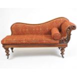 A Victorian upholstered chaise lounge