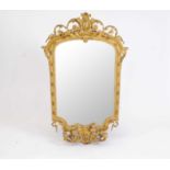 A highly decorative 19th century gilt framed girandole in the Chippendale style