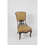 A Victorian upholstered chair