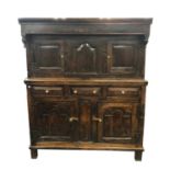A large 18th century and later oak food cupboard or dudarn