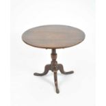 A 19th century snap-top country oak occasional table