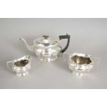 A three piece silver tea service