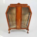 An Art Deco walnut veneered display cabinet