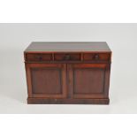 A small mahogany hall cupboard