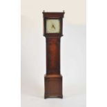 A 19th century country oak longcase clock with a painted 12" dial (faded)