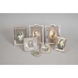 Seven silver mounted frames