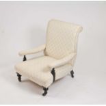 An Edwardian upholstered armchair