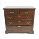 A 19th century country oak chest of two short and three long drawers