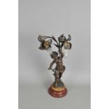 A French bronzed spelter figural desk lamp