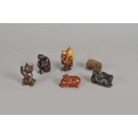 A collection of carved Japanese netsuke