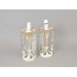 A pair of Victorian slice cut opaque and clear crystal table lustres