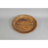 A large 18th century rustic farmhouse hewn shallow bowl / charger