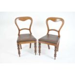 A set of six mahogany balloon back dining chairs