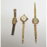 A quantity of three 9ct ladies wristwatches.