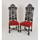 A set of four late 19th century William and Mary style carved and stained oak dining chairs, 134