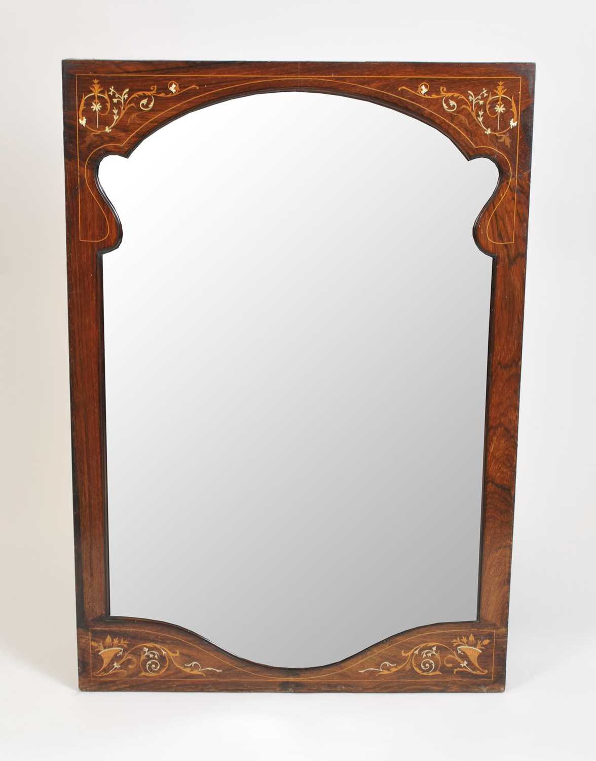 An Edwardian inlaid rosewood veneered wall mirror