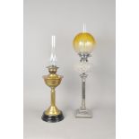 A silver-plated Corinthian column oil lamp with shade and chimney and one other