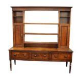 A 19th century oak mahogany crossbanded dresser, with a later three tier plate rack, 194 x 50.5 x