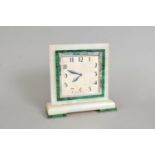 An Art Deco Swiss-made onyx and malachite framed mantle clock