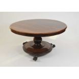 A Victorian rosewood breakfast table