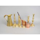 A mixed collection of antique copper and brass wares.