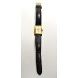 An 18ct yellow gold Longines wristwatch on leather strap