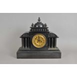 A large 19th century French slate cased mantle clock
